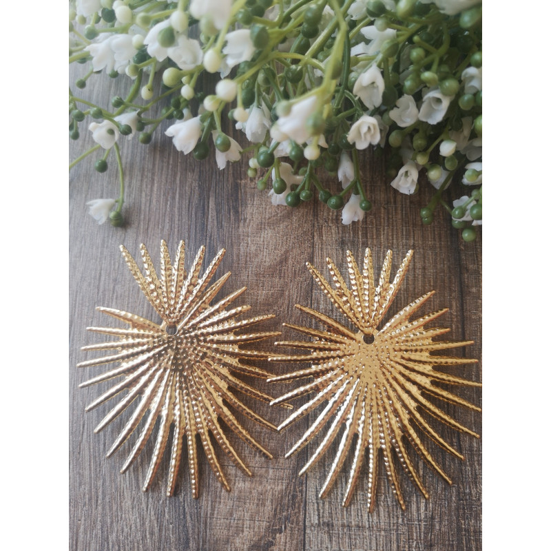 Pendiente dorado aspas