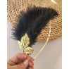Diadema con hoja dorada y plumas negras